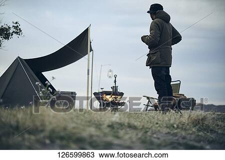 Japanese man solo camping View Large Photo Image Stock Image - Japanese man solo camping. Fotosearch
