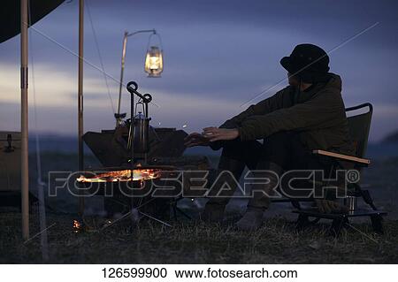 Japanese man solo camping View Large Photo Image Stock Image - Japanese man solo camping. Fotosearch
