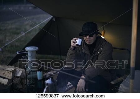 Japanese man solo camping View Large Photo Image Stock Photo - Japanese man solo camping. Fotosearch