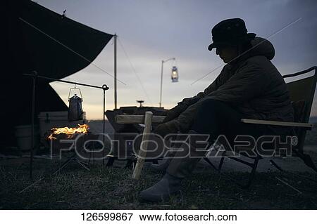 Japanese man solo camping View Large Photo Image Stock Photo - Japanese man solo camping. Fotosearch