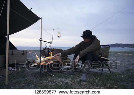 Japanese man solo camping View Large Photo Image Stock Photo - Japanese man solo camping. Fotosearch