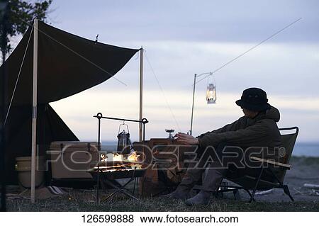Japanese man solo camping View Large Photo Image Stock Photo - Japanese man solo camping. Fotosearch