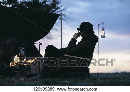 Japanese man solo camping View Large Photo Image Stock Photo - Japanese man solo camping. Fotosearch