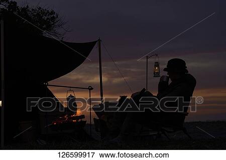 Japanese man solo camping View Large Photo Image Stock Photo - Japanese man solo camping. Fotosearch