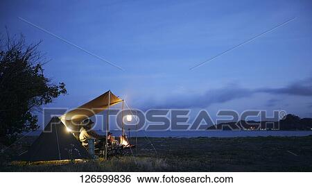 Japanese man solo camping View Large Photo Image Stock Photograph - Japanese man solo camping. Fotosearch