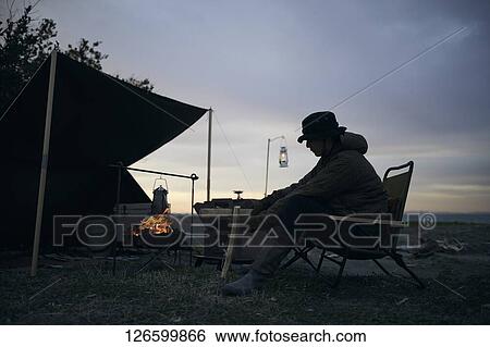 Japanese man solo camping View Large Photo Image Stock Photograph - Japanese man solo camping. Fotosearch