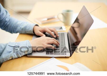 Japanese man working from home View Large Photo Image Stock Image - Japanese man working from home. Fotosearch