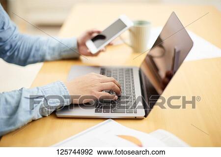 Japanese man working from home View Large Photo Image Stock Image - Japanese man working from home. Fotosearch