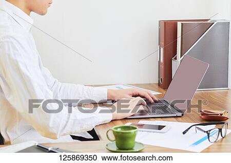 Japanese man working from home View Large Photo Image Stock Image - Japanese man working from home. Fotosearch