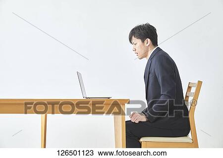 Japanese man working from home View Large Photo Image Stock Image - Japanese man working from home. Fotosearch