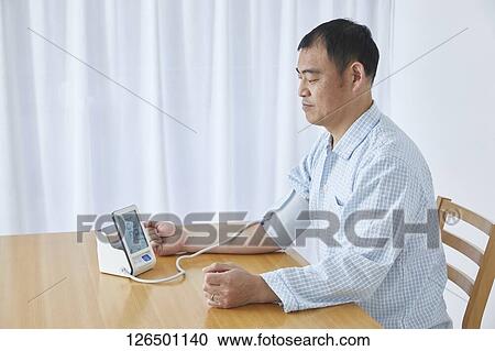 Japanese man working from home View Large Photo Image Stock Image - Japanese man working from home. Fotosearch