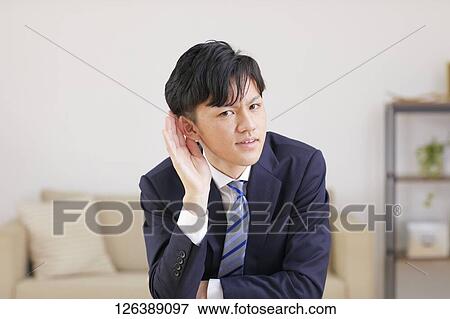Japanese man working from home View Large Photo Image Stock Photo - Japanese man working from home. Fotosearch