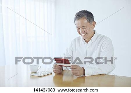 Japanese Middle Aged Man Smiling In The Room View Large Photo Image Stock Image - Japanese Middle Aged Man Smiling In The Room. Fotosearch