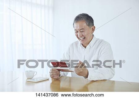 Japanese Middle Aged Man Smiling In The Room View Large Photo Image Stock Photograph - Japanese Middle Aged Man Smiling In The Room. Fotosearch