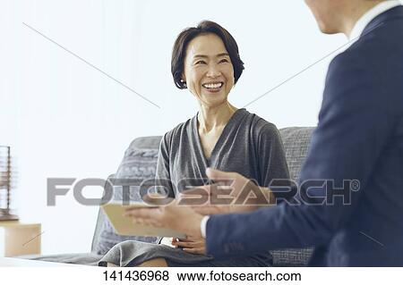 Japanese Middle Aged Woman Smiling In The Room View Large Photo Image Stock Photo - Japanese Middle Aged Woman Smiling In The Room. Fotosearch