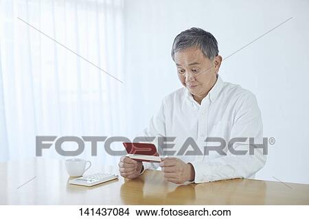 Picture - Japanese Senior At Home. Fotosearch