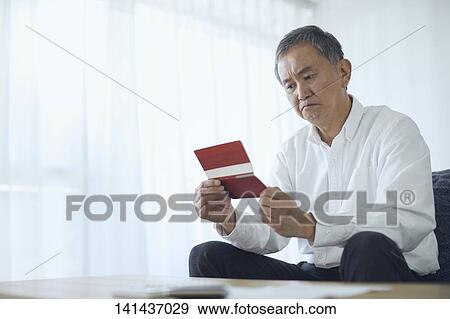 Stock Photo - Japanese Senior At Home. Fotosearch