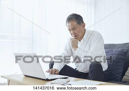 Stock Photograph - Japanese Senior At Home. Fotosearch