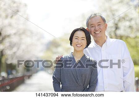 Japanese Senior Couple Smiling Outside View Large Photo Image Picture - Japanese Senior Couple Smiling Outside. Fotosearch