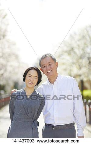 Japanese Senior Couple Smiling Outside View Large Photo Image Stock Image - Japanese Senior Couple Smiling Outside. Fotosearch