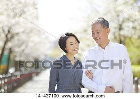 Japanese Senior Couple Smiling Outside View Large Photo Image Stock Image - Japanese Senior Couple Smiling Outside. Fotosearch