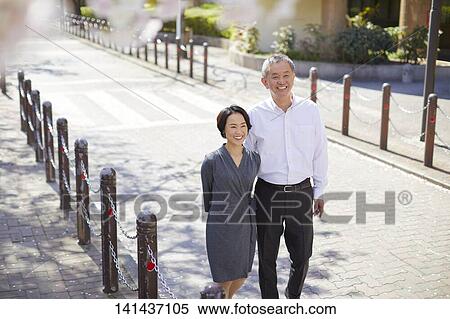 Japanese Senior Couple Smiling Outside View Large Photo Image Stock Photography - Japanese Senior Couple Smiling Outside. Fotosearch