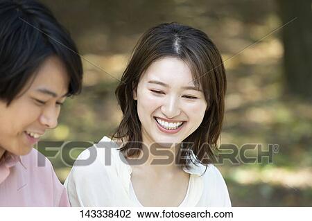 Japanese university students at a city park View Large Photo Image Stock Image - Japanese university students at a city park. Fotosearch