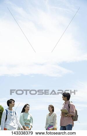 Japanese university students at a city park View Large Photo Image Stock Photo - Japanese university students at a city park. Fotosearch
