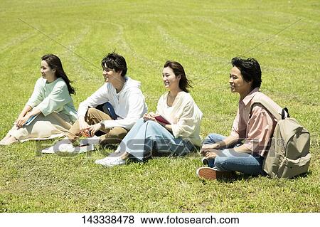 Stock Photo - Japanese university students at a city park. Fotosearch