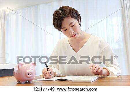 Japanese woman at home View Large Photo Image Stock Photo - Japanese woman at home. Fotosearch