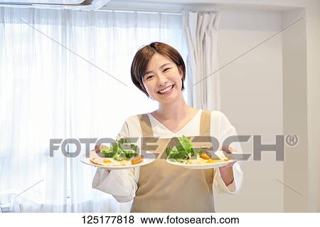 Stock Photo - Japanese woman at home. Fotosearch