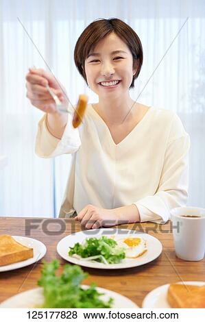 Japanese woman at home View Large Photo Image Stock Photo - Japanese woman at home. Fotosearch