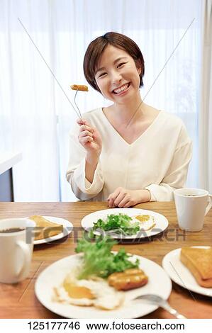 Japanese woman at home View Large Photo Image Stock Photograph - Japanese woman at home. Fotosearch