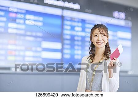 Japanese woman at the airport View Large Photo Image Stock Image - Japanese woman at the airport. Fotosearch