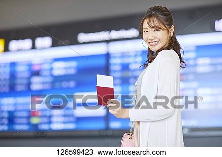 Japanese woman at the airport View Large Photo Image Stock Image - Japanese woman at the airport. Fotosearch