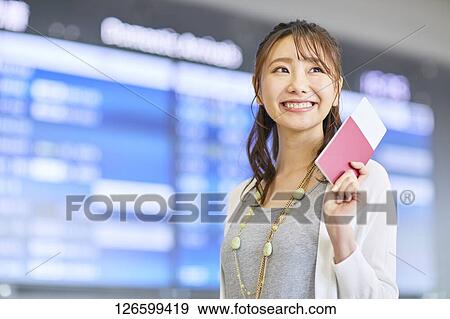 Japanese woman at the airport View Large Photo Image Stock Photo - Japanese woman at the airport. Fotosearch