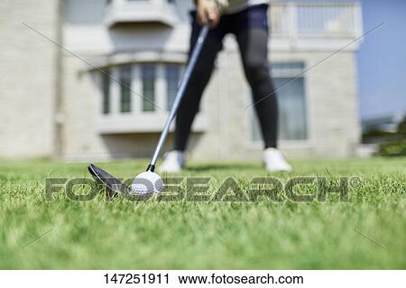 Japanese woman practicing golf in the garden View Large Photo Image Stock Image - Japanese woman practicing golf in the garden. Fotosearch