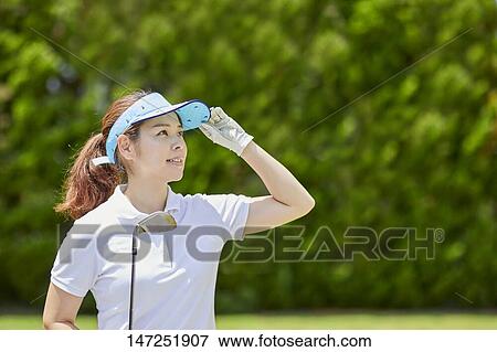 Japanese woman practicing golf in the garden View Large Photo Image Stock Photo - Japanese woman practicing golf in the garden. Fotosearch