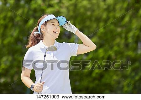 Japanese woman practicing golf in the garden View Large Photo Image Stock Photo - Japanese woman practicing golf in the garden. Fotosearch