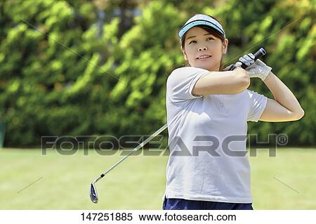 Japanese woman practicing golf in the garden View Large Photo Image Stock Photography - Japanese woman practicing golf in the garden. Fotosearch