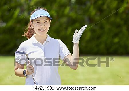 Japanese woman practicing golf in the garden View Large Photo Image Stock Photography - Japanese woman practicing golf in the garden. Fotosearch