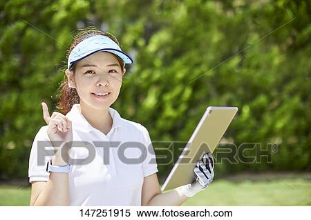 Japanese woman practicing golf in the garden View Large Photo Image Stock Photography - Japanese woman practicing golf in the garden. Fotosearch
