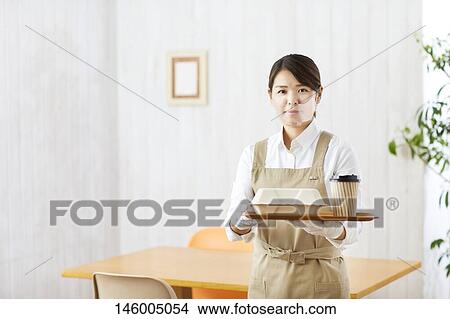 Japanese woman wearing face shield View Large Photo Image Picture - Japanese woman wearing face shield. Fotosearch