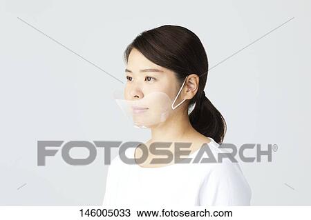 Japanese woman wearing face shield View Large Photo Image Stock Image - Japanese woman wearing face shield. Fotosearch