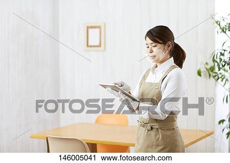 Japanese woman wearing face shield View Large Photo Image Stock Image - Japanese woman wearing face shield. Fotosearch