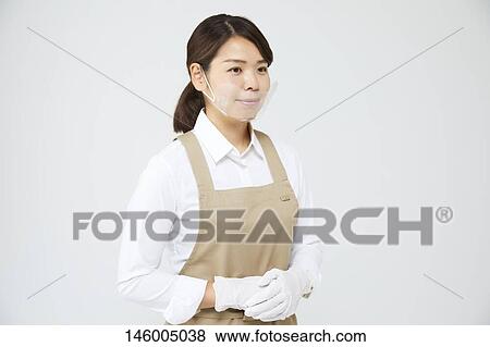 Japanese woman wearing face shield View Large Photo Image Stock Photo - Japanese woman wearing face shield. Fotosearch