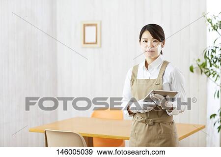 Japanese woman wearing face shield View Large Photo Image Stock Photo - Japanese woman wearing face shield. Fotosearch
