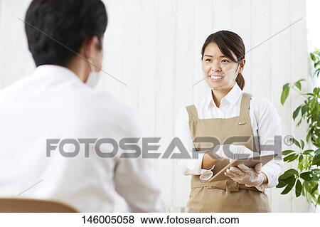 Japanese woman wearing face shield View Large Photo Image Stock Photo - Japanese woman wearing face shield. Fotosearch