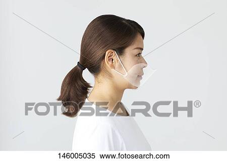 Japanese woman wearing face shield View Large Photo Image Stock Photography - Japanese woman wearing face shield. Fotosearch