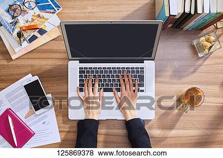 Japanese woman working from home View Large Photo Image Stock Photo - Japanese woman working from home. Fotosearch